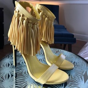 Bright yellow fringe tassel stiletto high heels